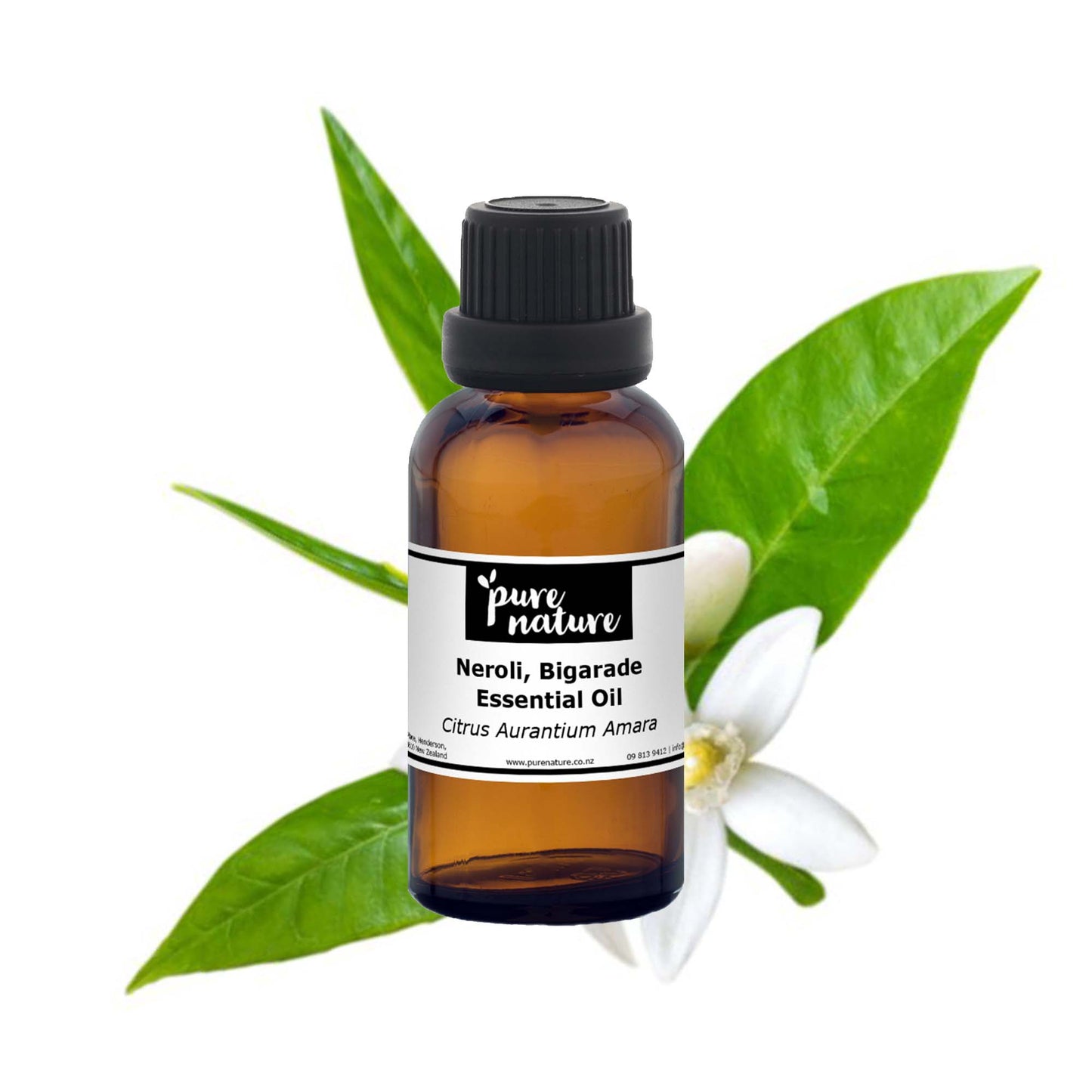 Bottles of purenaturenz Neroli Bigarade essential oil with fresh orange blossoms and citrus leaves on a wooden background.
