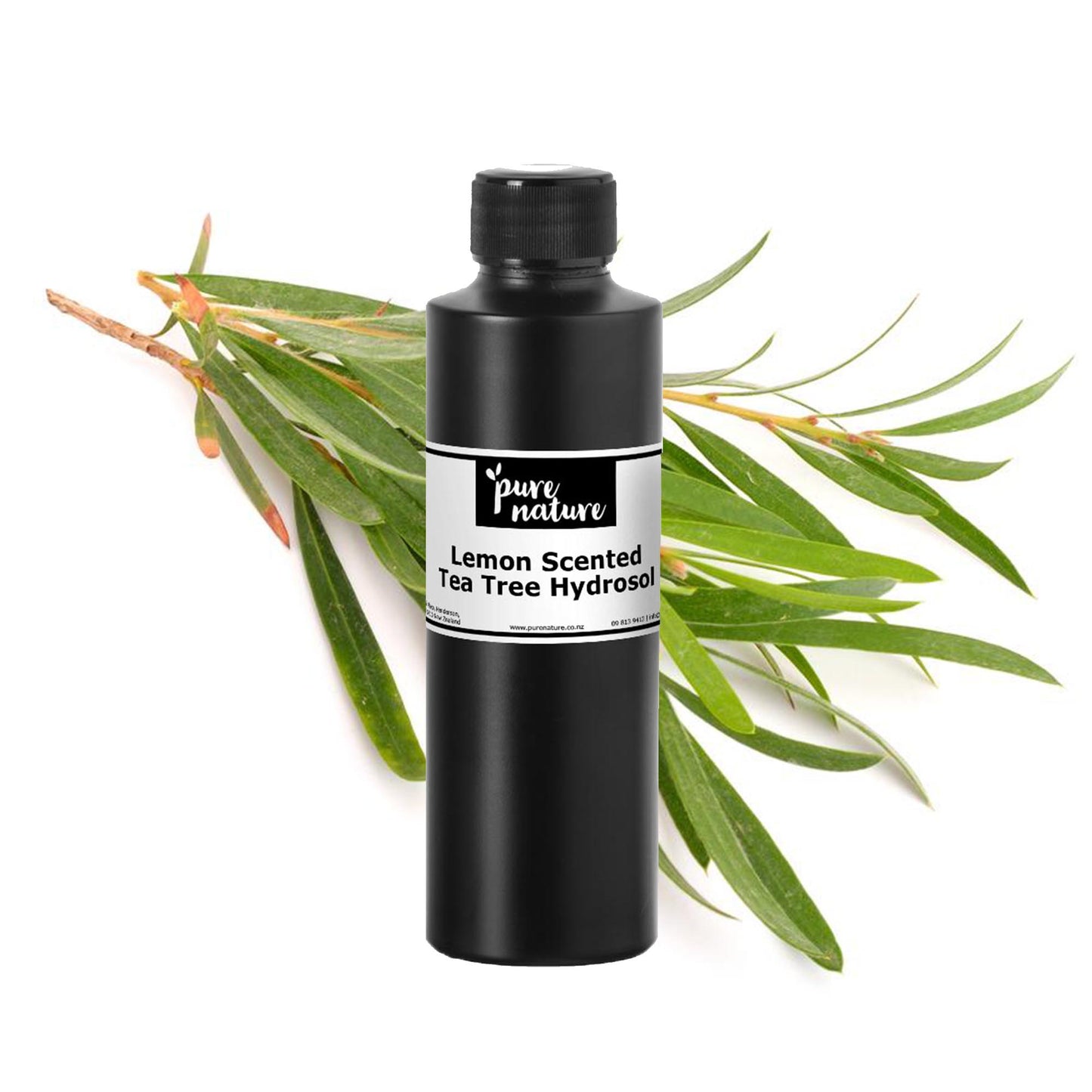 Lemon scented tea tree essential oil in a clear glass bottle, with fresh lemon slices and tea tree leaves around it.