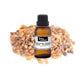 Amber bottle of Frankincense oil sitting on frankincnse resin