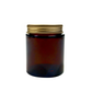 Amber 100ml glass pot for packaging by purenaturenz, showcasing a clear glass container with a rounded shape and smooth finish.