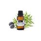Himalayan organic juniper berry essential oil in a glass bottle, with fresh juniper berries and green leaves beside it.