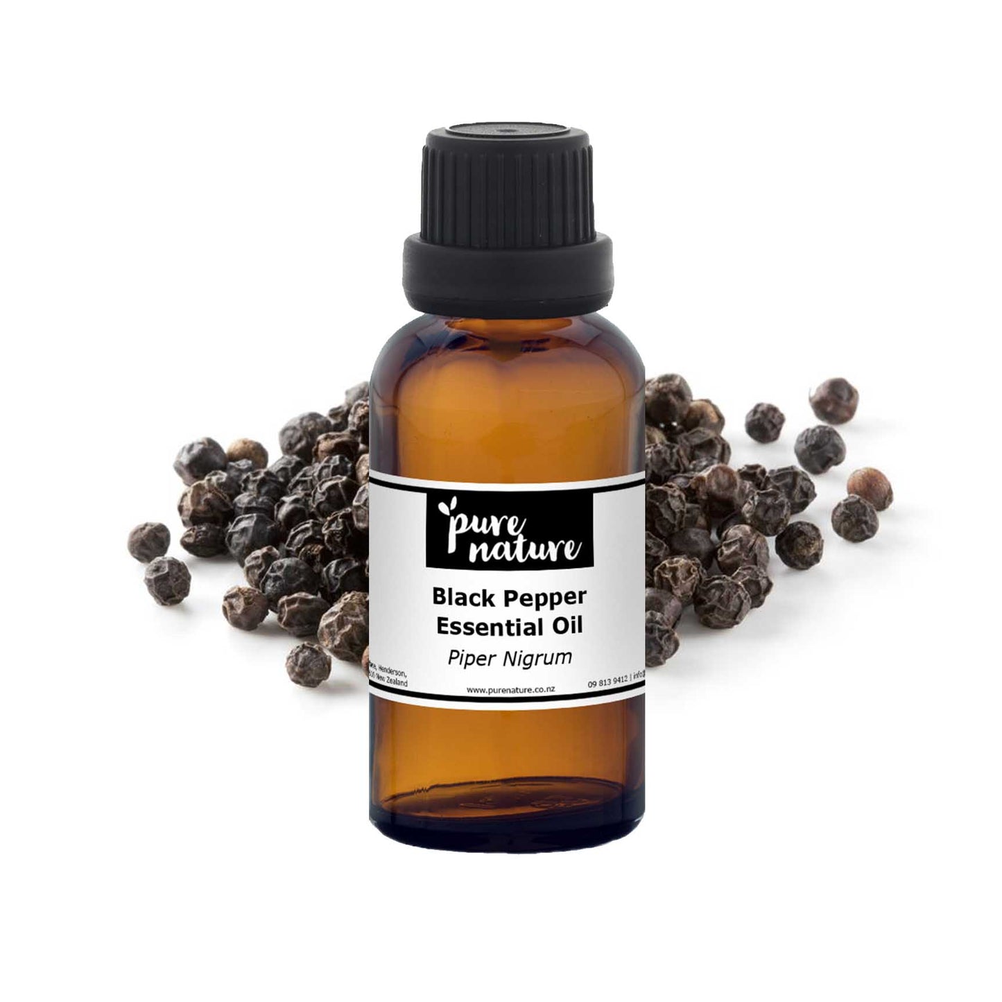 Purenaturenz black pepper essential oil bottle with black peppercorns on a white background