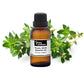 A bottle of purenaturenz white thyme essential oil with a sprig of fresh thyme on a white background.