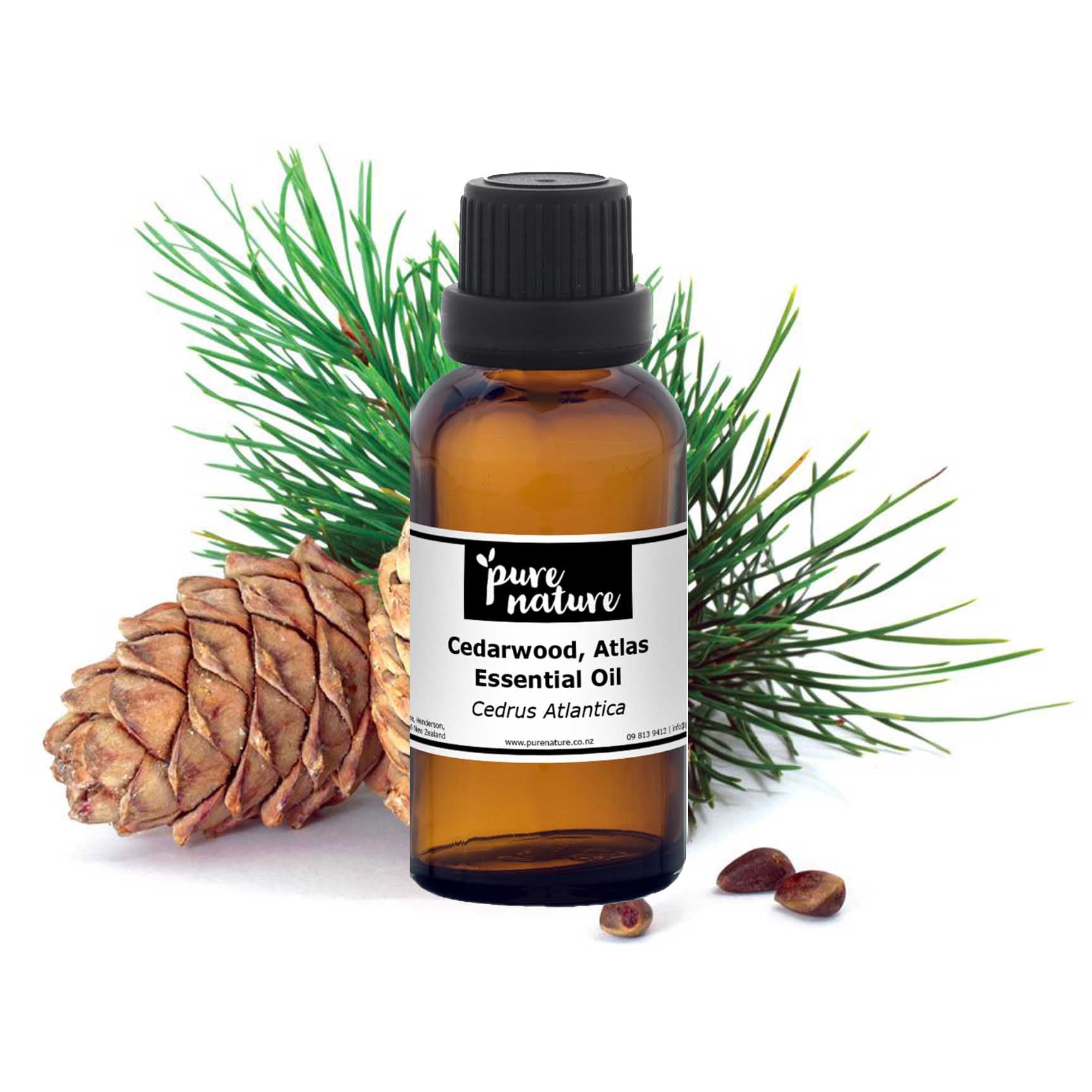 Bottle of purenaturenz Cedarwood Atlas essential oil with amber glass container and white label, natural aromatic oil for wellness