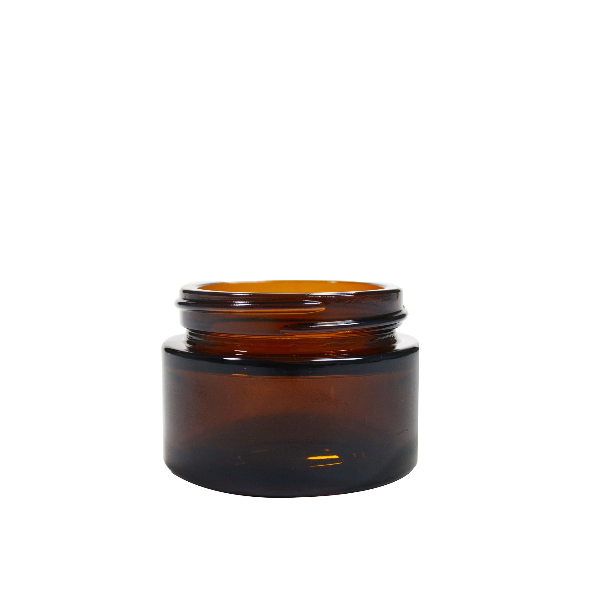 Amber 30ml glass pot for packaging by purenaturenz, shown with a clear view of the container and lid.