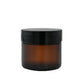 Amber 60ml glass pot for packaging by Purenaturenz, shown with a clear view of the compact, reusable container.